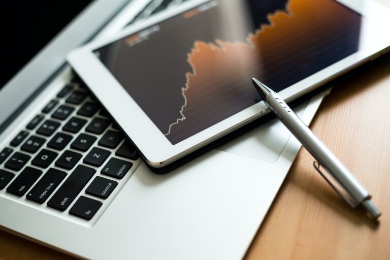 Business chart and diagrams on digital tablet